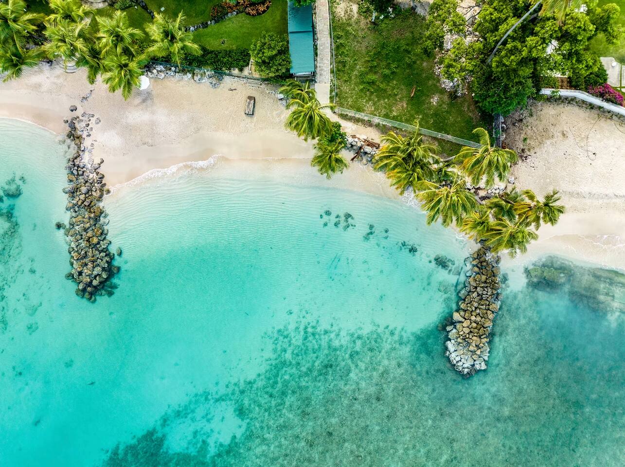 Aerial of beach within 5 min walk of Coral Beach 105