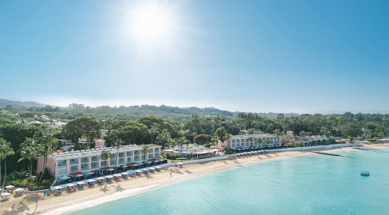 Beachfront escape with turquoise waters, sandy shore, and tropical views