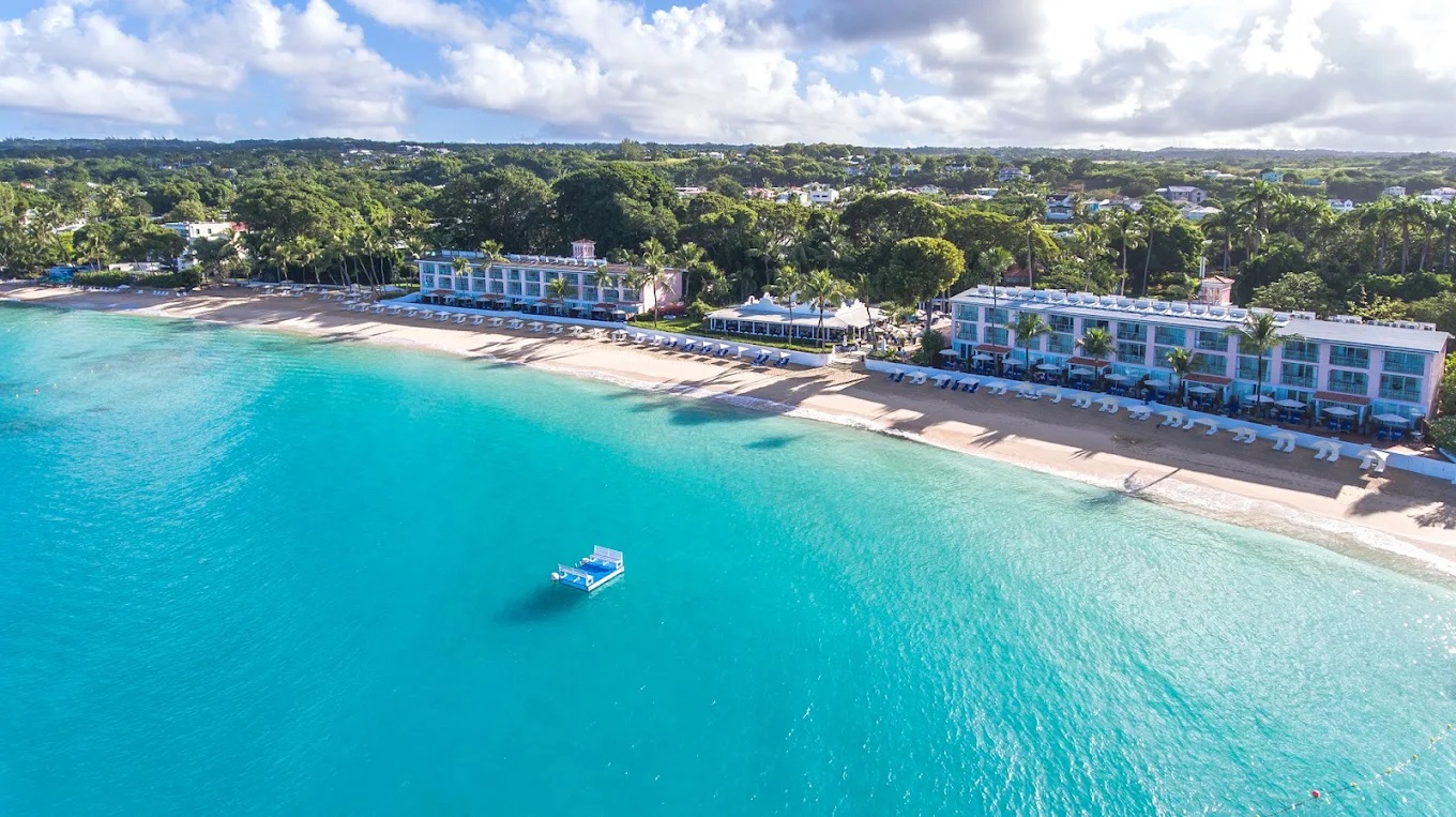 Stunning beachfront resort with turquoise water and a serene sandy shore
