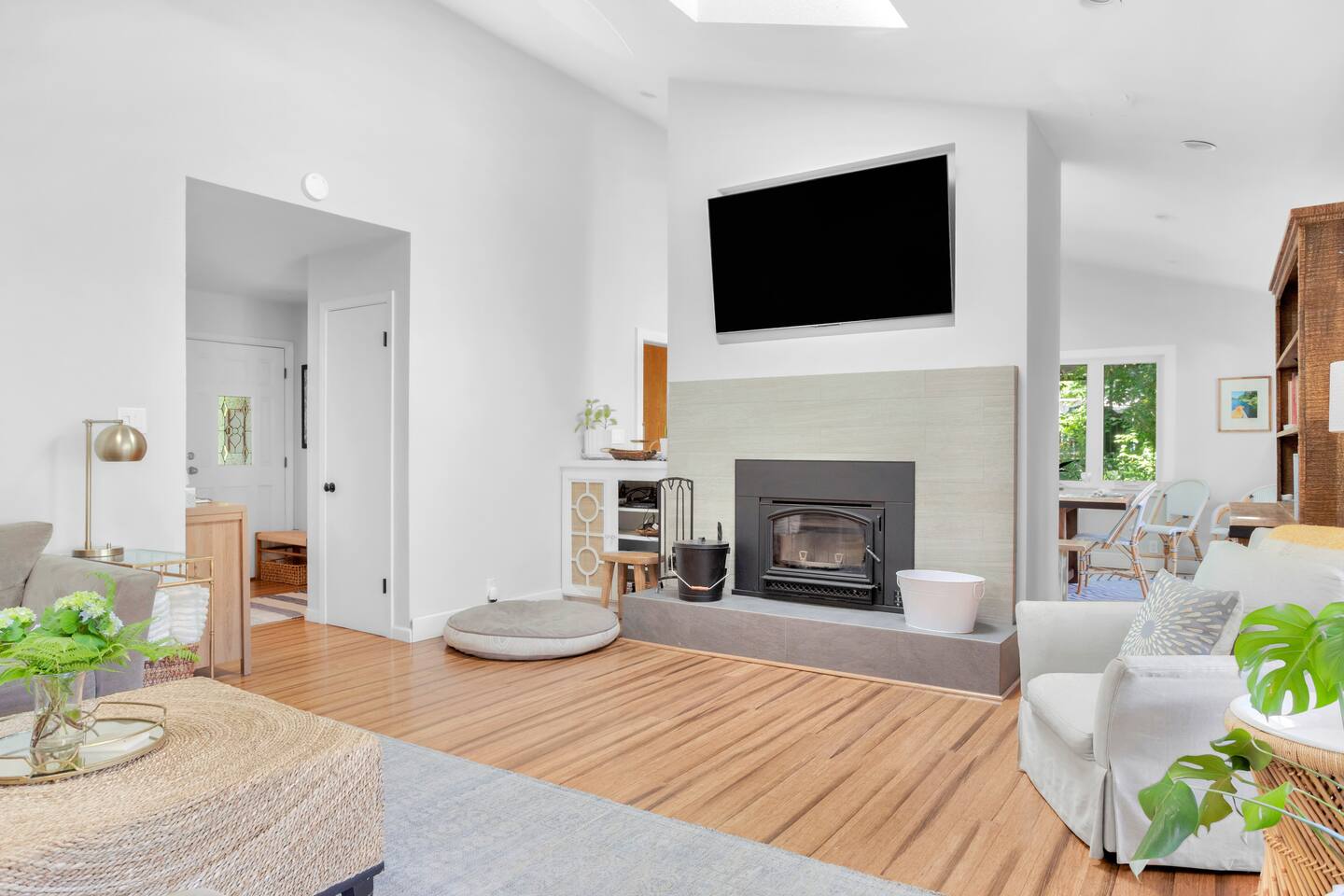 Experience cozy evenings in this inviting living space, perfect for curling up with a good book or enjoying quality time with loved ones by the soft glow of the lights.