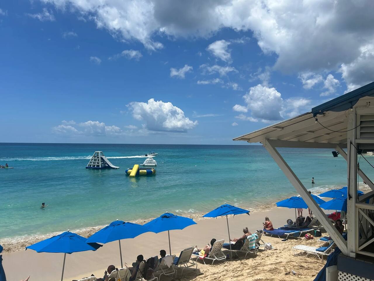 Mullins Bay: (7 minute Taxi) - Chair Rentals, Water Sports, Trampoline, Slides, Swimming.