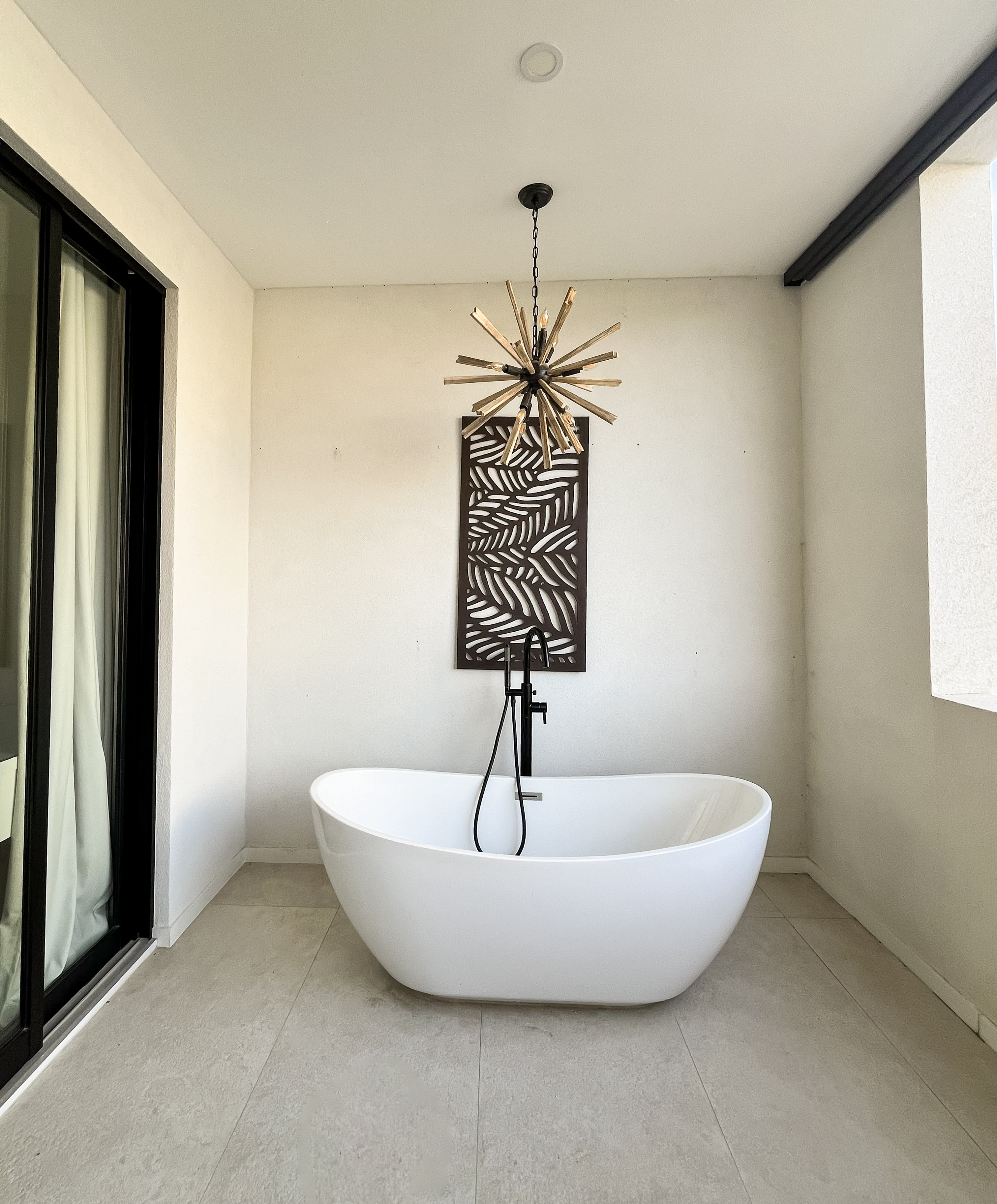 Spa-like outdoor soaking tub with luxe modern design