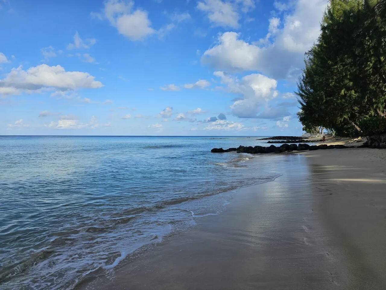 Heron Bay: (10 minute walk) or (2 minute Taxi) - Quiet with lots of views, shade and a long stretch of beach to walk or run.
