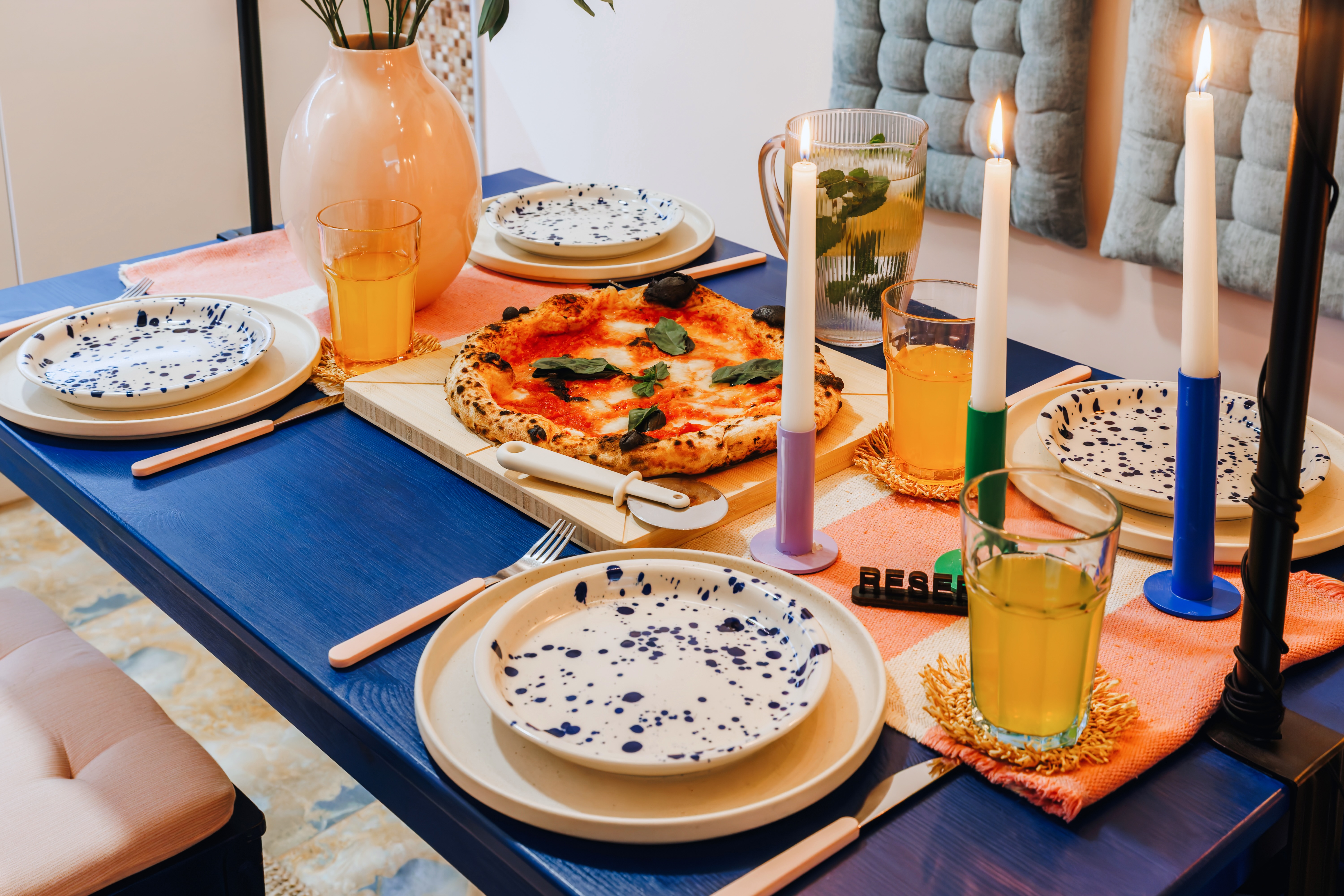 Colorful candlelit dining setup perfect for cozy shared meals