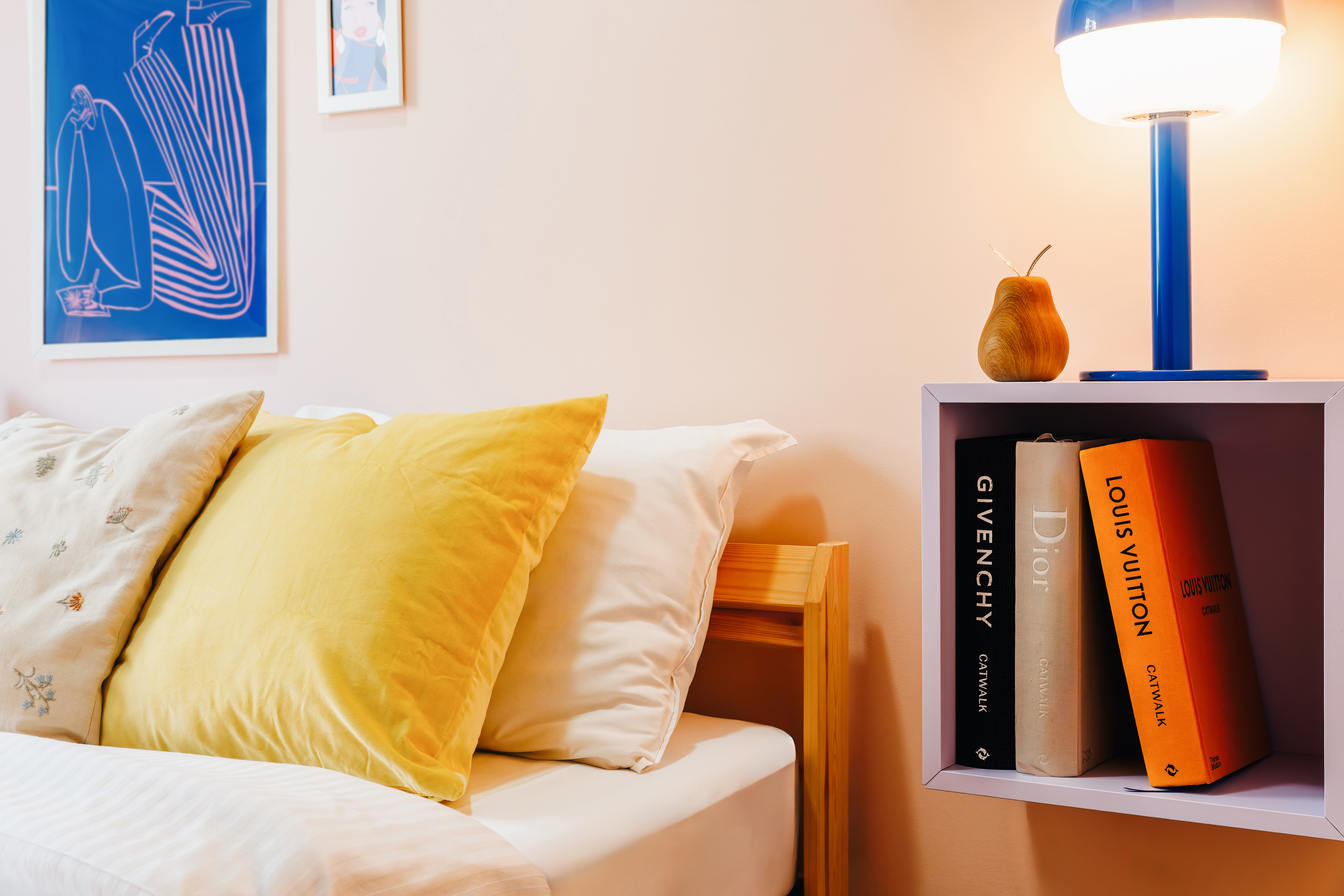 Cozy designer bedroom corner with warm lighting and stylish decor