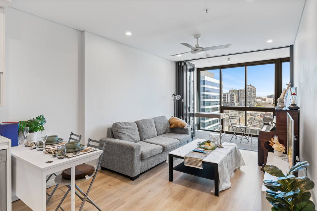 City Lights Apartment w/ Balcony + Pool Access