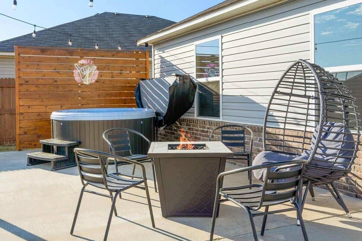 Back patio - Large outdoor space with Classic Nordic Spa that seats up to 6 adults. 
Stainless steel propane grill for grilling.
Fire pit table and seating for 5.