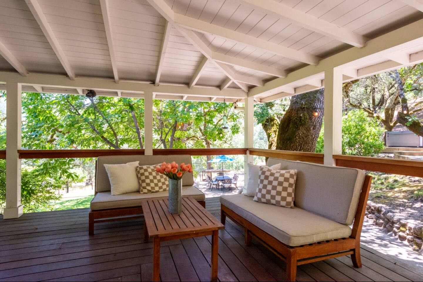 Relax on the upper deck, shaded by trees and perfect for enjoying a morning coffee or evening wine.