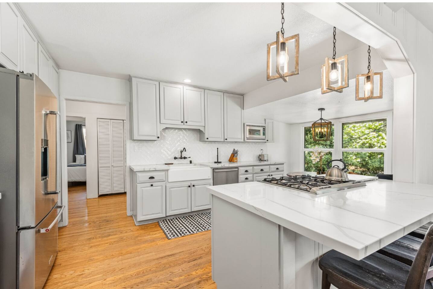 Stylish and functional, the kitchen includes all the essentials—from a dishwasher to a spacious fridge.