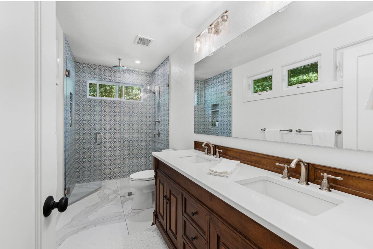 Modern bathroom with a walk-in shower—perfect for refreshing after a day out.