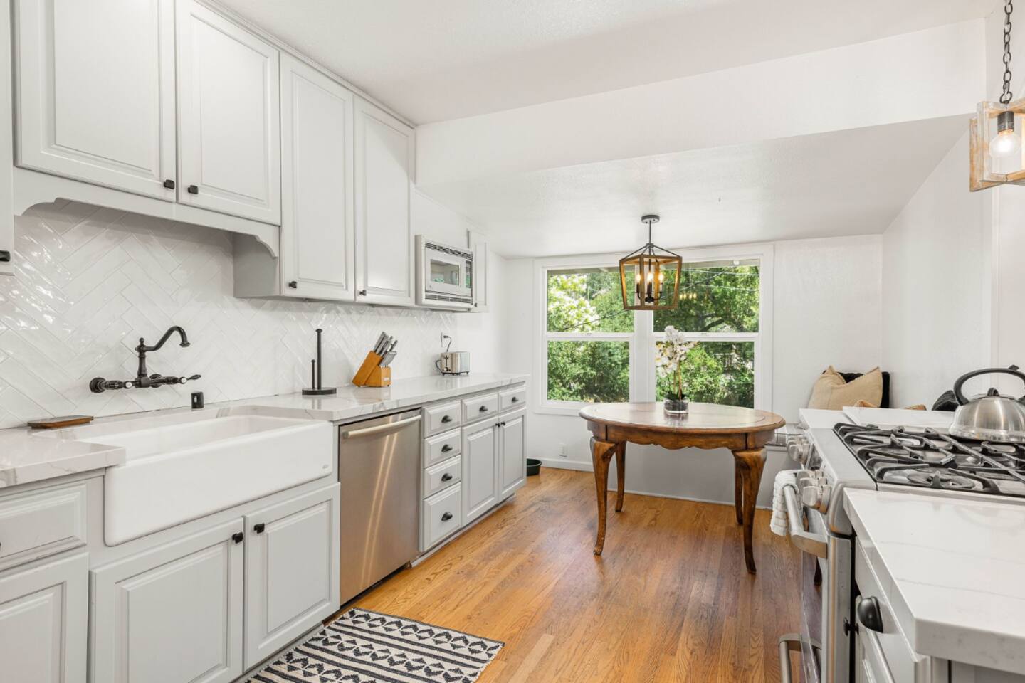 Whip up gourmet meals or quick snacks with ease in this well-equipped kitchen.