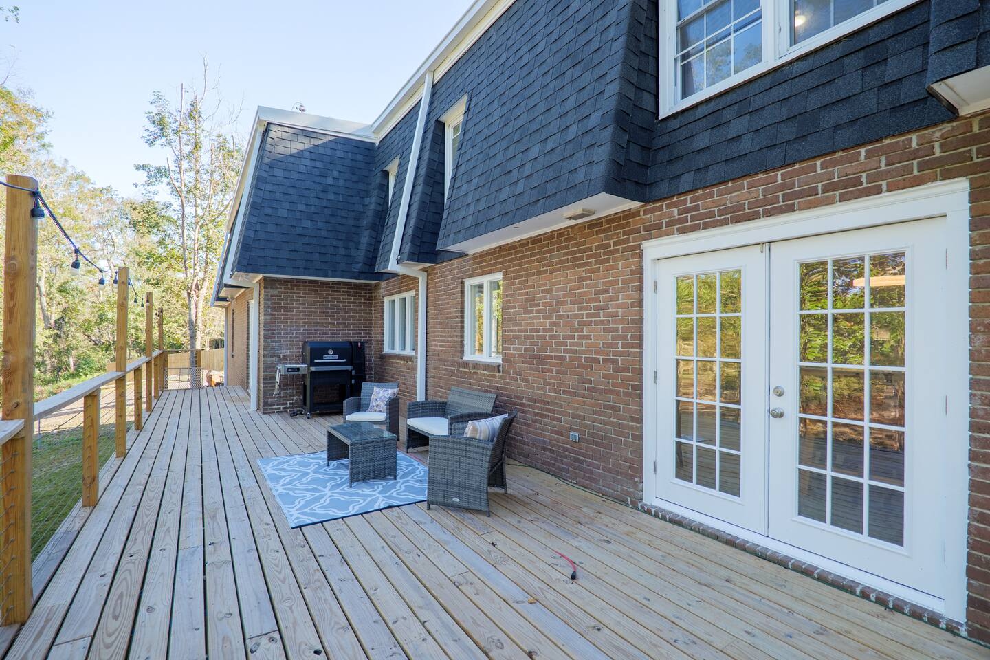 Sleeps 18 Riverfront Getaway with Game Room & Deck