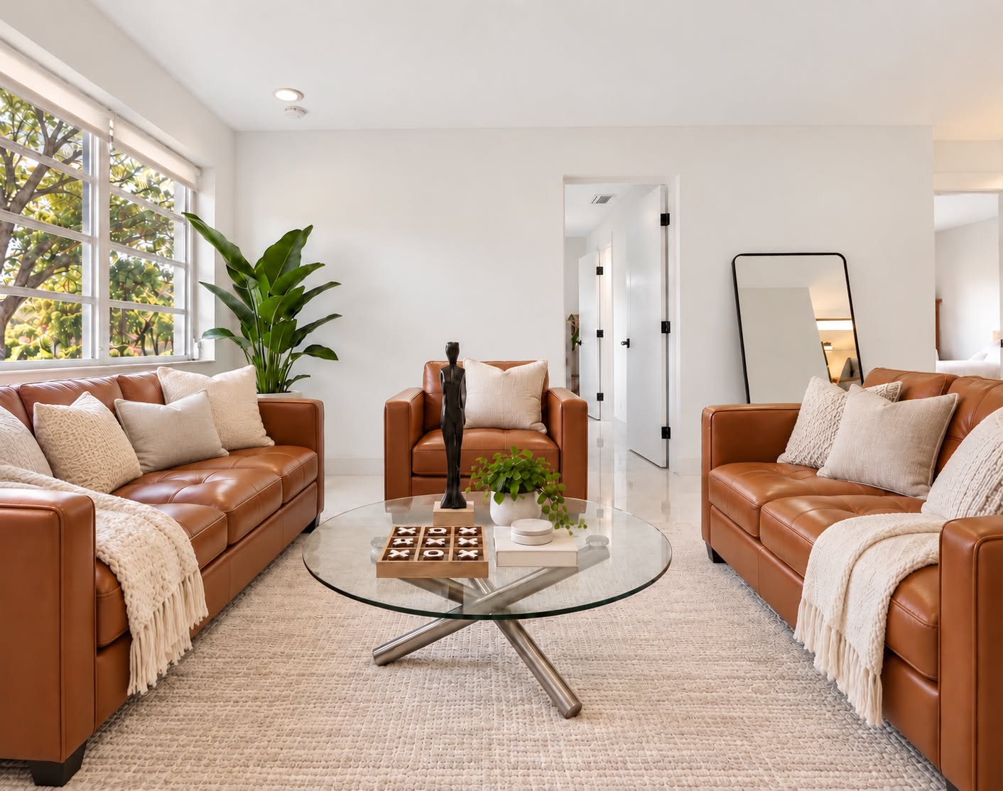 Bright modern lounge with leather seating and abundant natural light