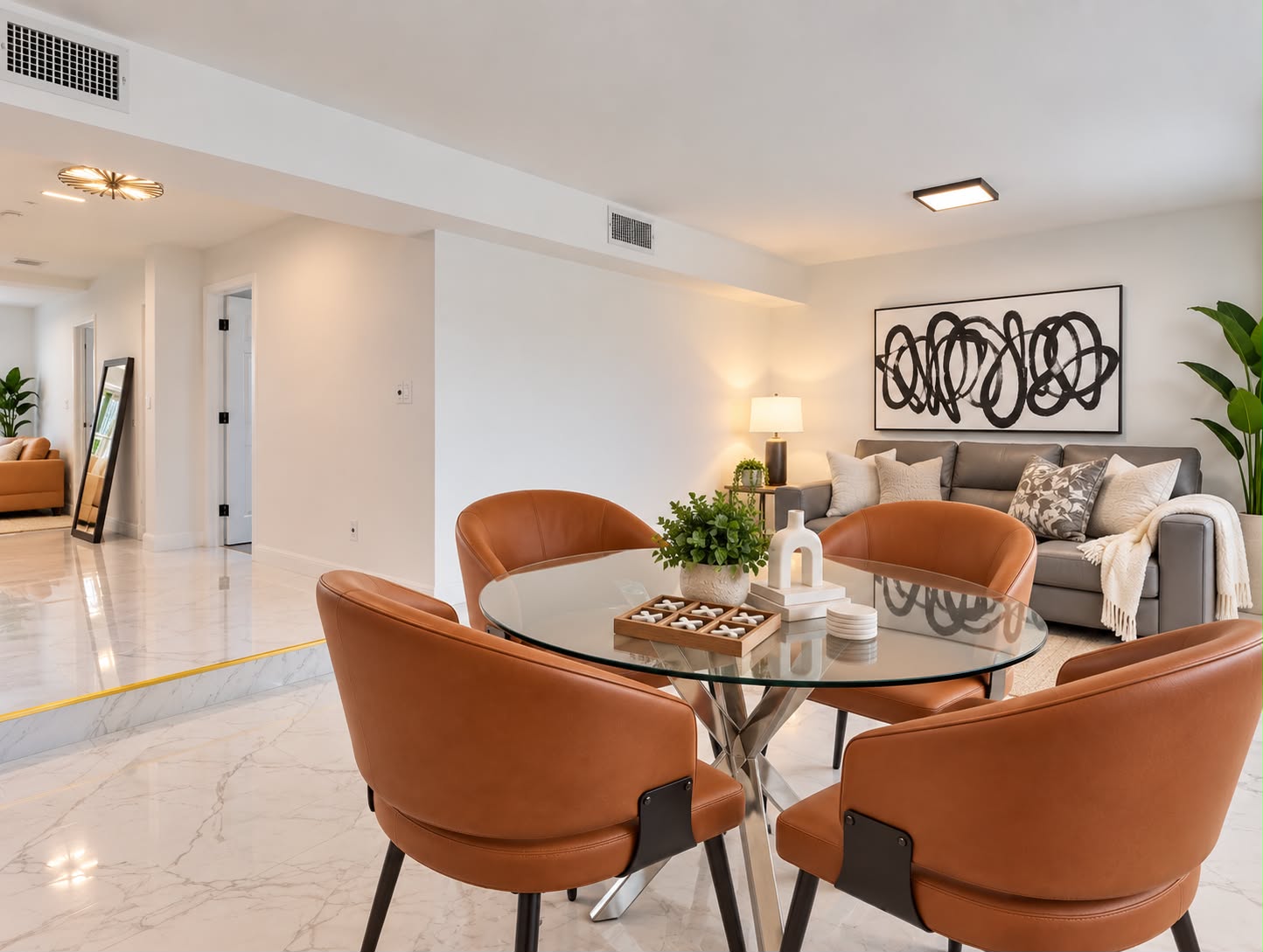 Bright modern living area with chic dining space and stylish decor