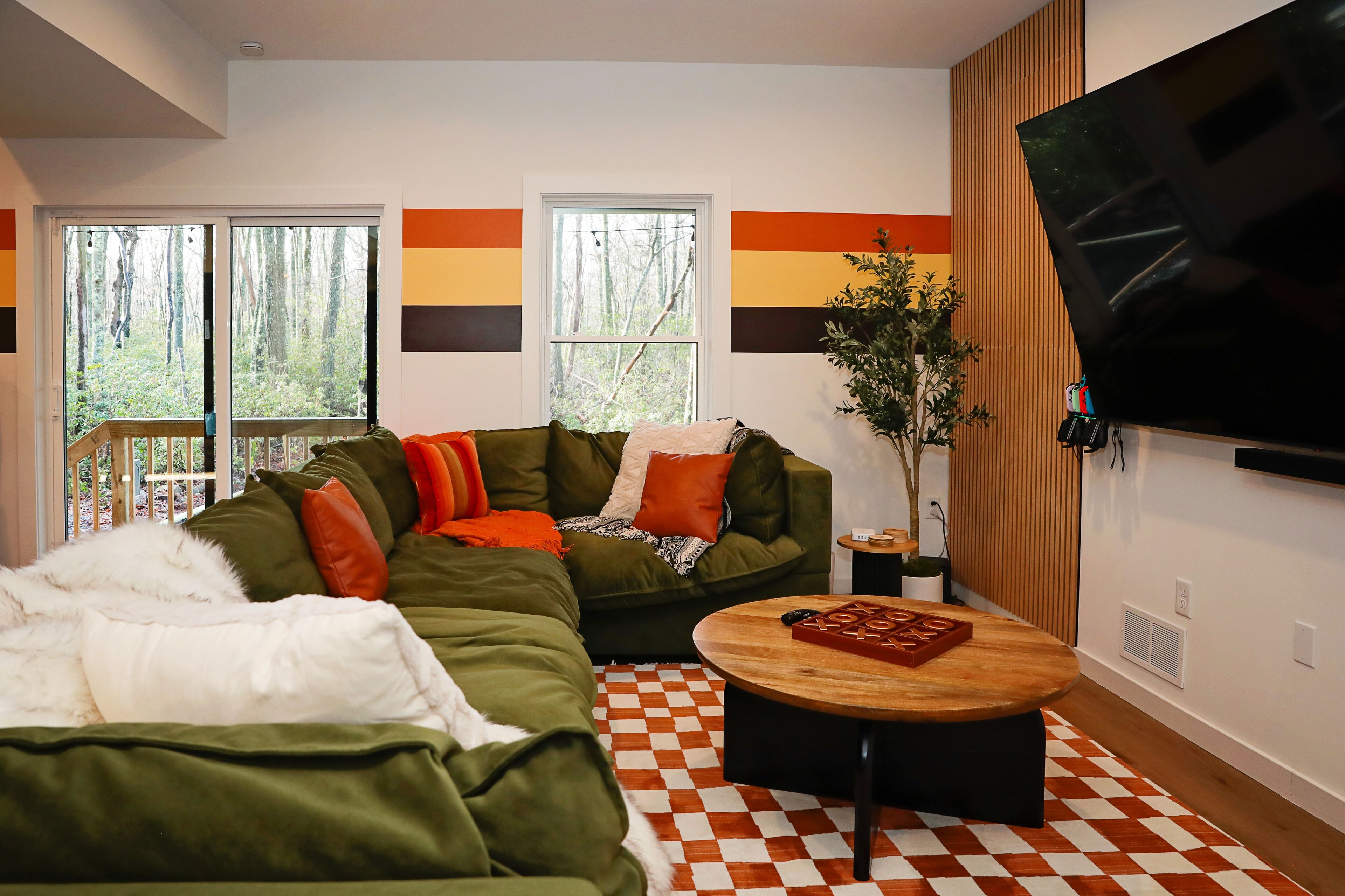 Sectional sofa welcomes you to get cozy for a game or movie night.