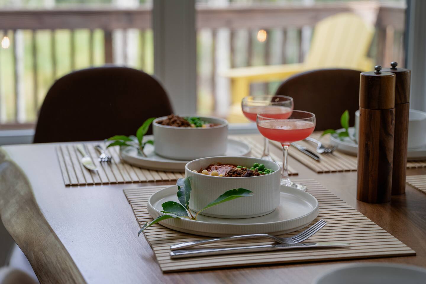 The dining room table welcomes up to 12 people to enjoy a delicious meal with great conversation.