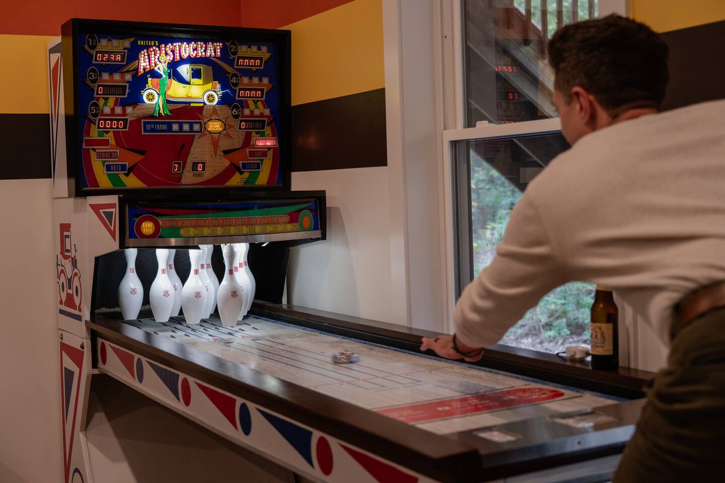 Vintage shuffleboard bowling game in the rec room on the first floor.