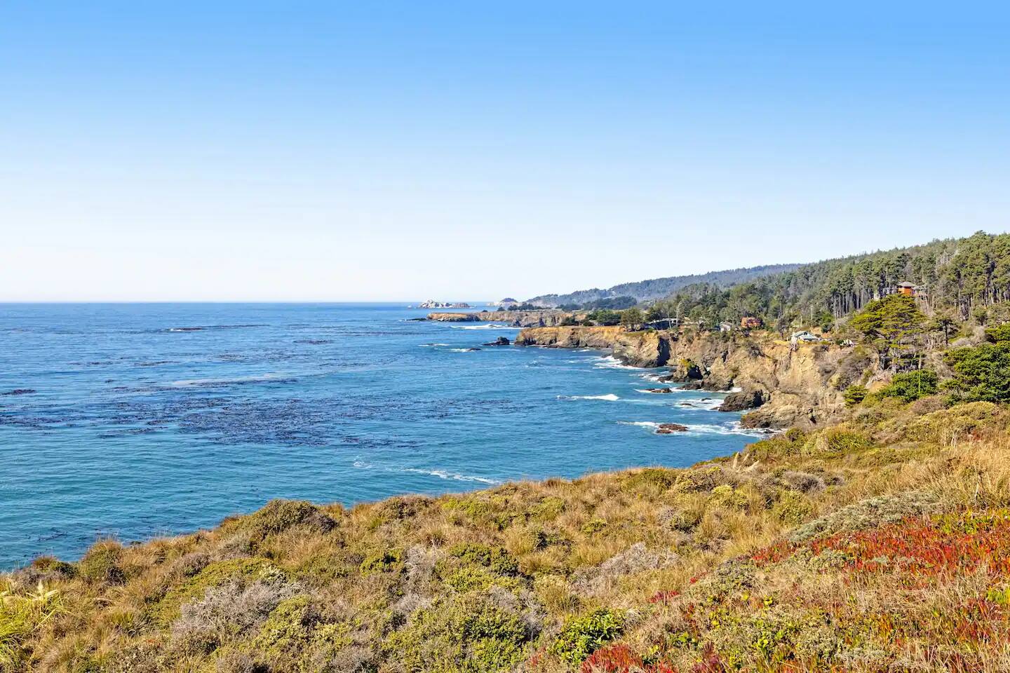 The take breather and unwind as the waves of the stunning blue ocean crashes to the cliffside.