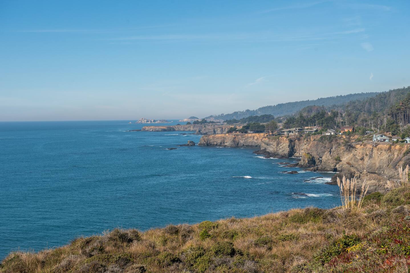 Marvel at the stunning ocean view from the cliffside, a breathtaking blend of rugged beauty and serene blue waters.