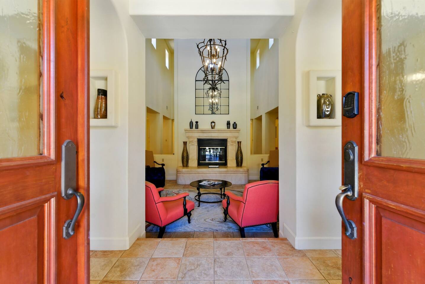 Relax in the cozy living room, complete with plush seating and a warm ambiance perfect for unwinding or connecting with loved ones.