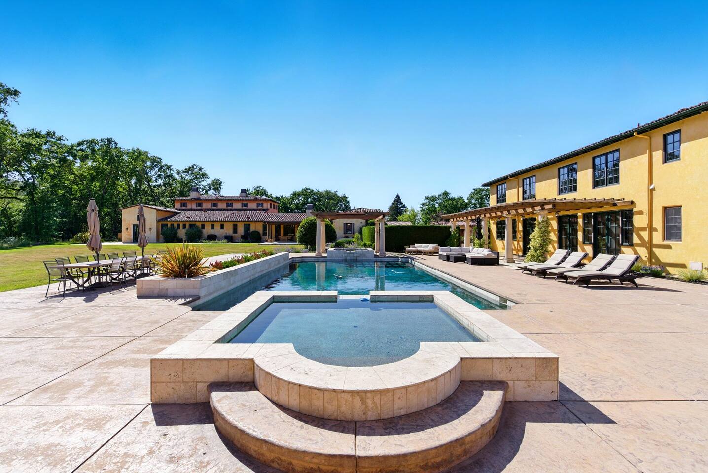 Enjoy a refreshing plunge in the outdoor spa and pool, all while being surrounded by nature.