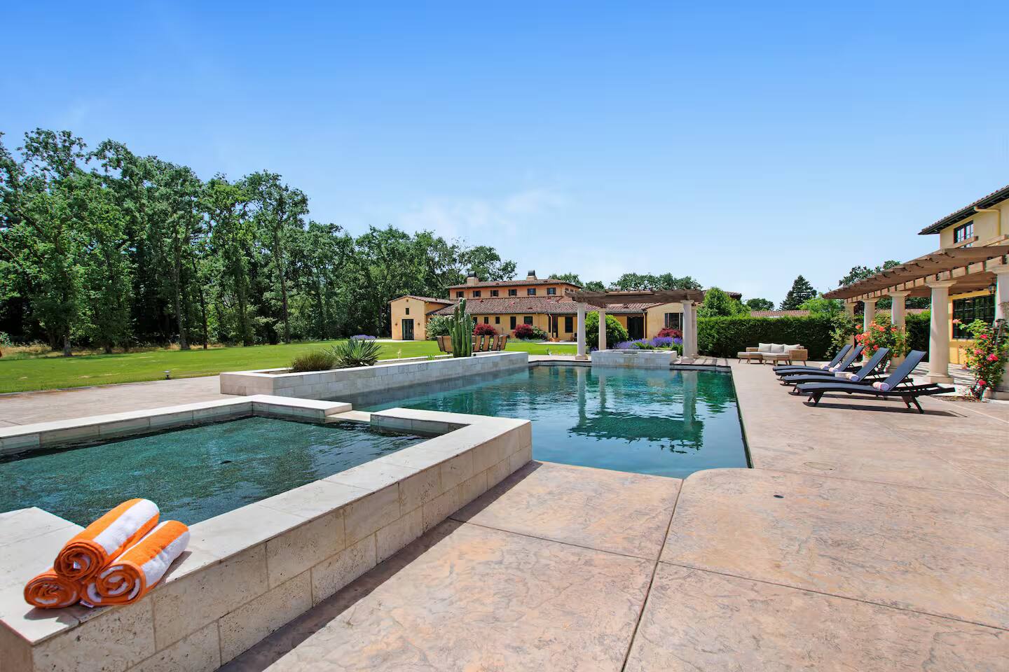 Enjoy a refreshing plunge in the outdoor spa and pool, all while being surrounded by nature.