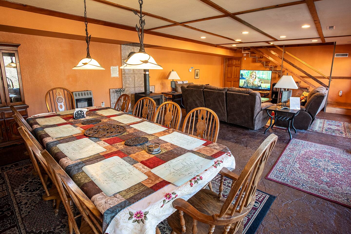 This cozy property near Buffalo River has a rustic open layout, perfect for group stays. With comfy seating, a large TV, and cabin-like charm, it’s the ideal retreat after a day at the river.