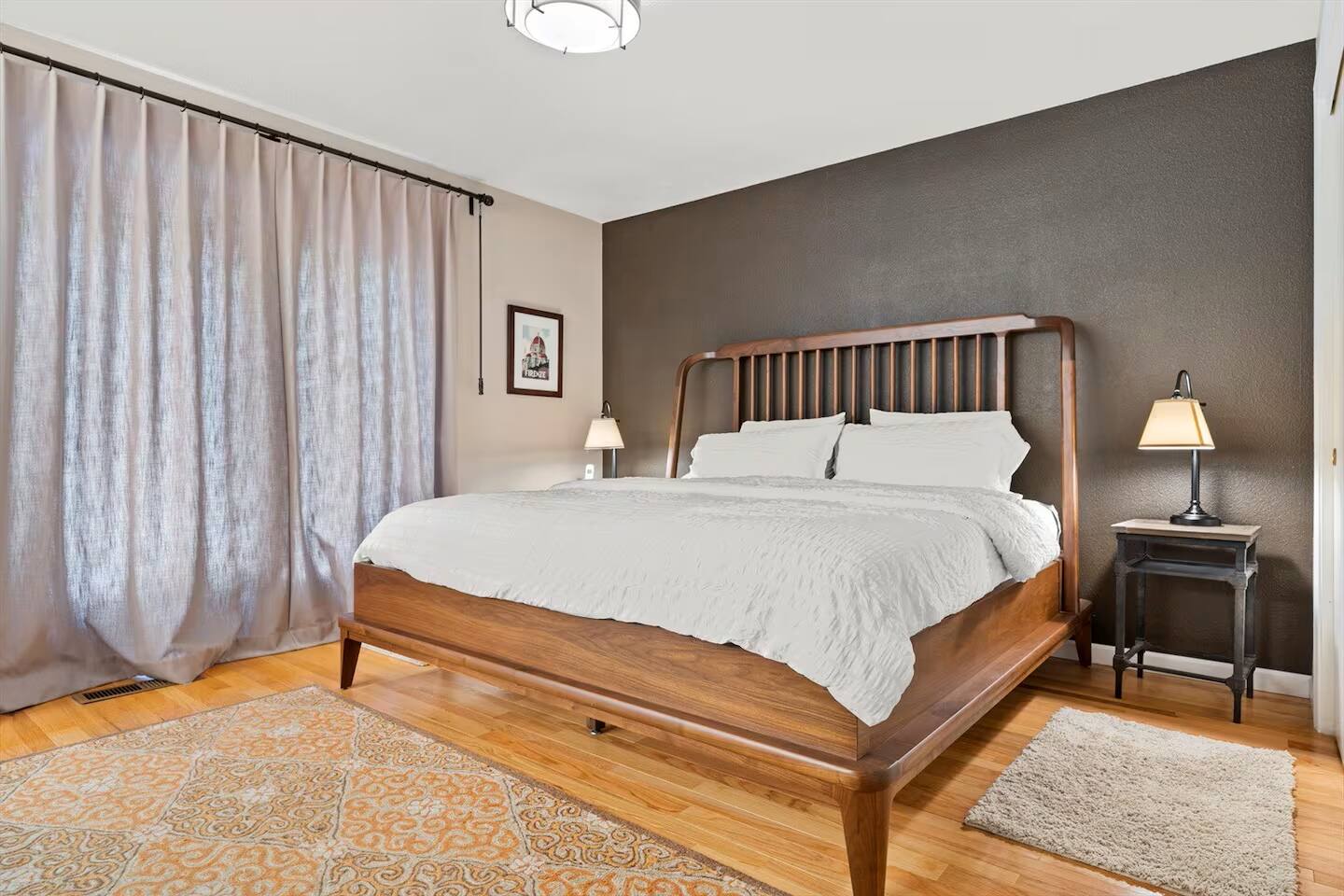 Relax in the luxurious king bedroom, cozy elegance invites you for a restful night's sleep.