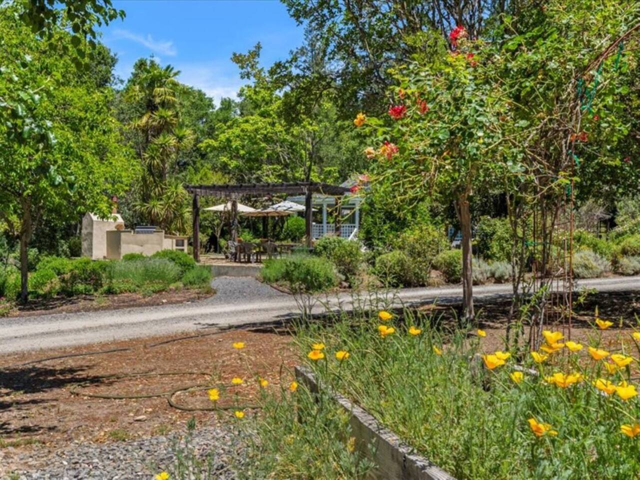 Immerse yourself in the beauty of vibrant, blooming flowers that surrounds the property, creating a colorful paradise that enhances the tranquil atmosphere of your stay.