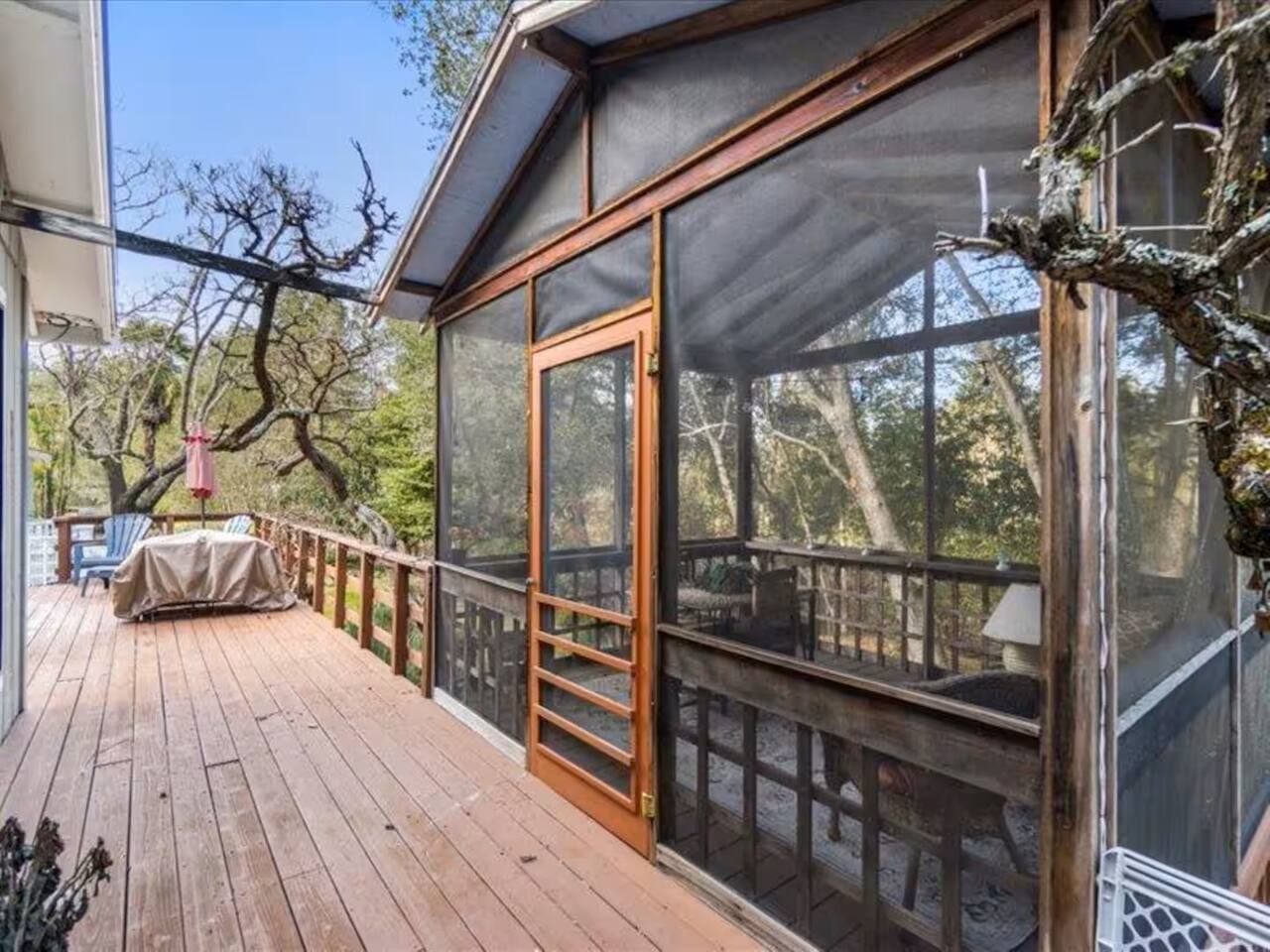 Delight in the outdoors while staying cozy in the charming screened porch. Perfect for lounging and catching up on your reading.