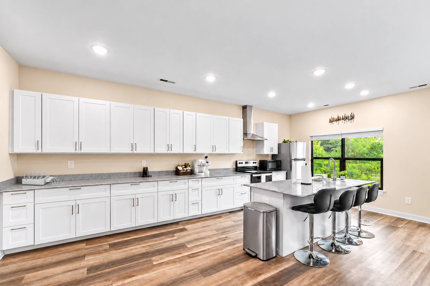 With premium appliances and plenty of counter space, this kitchen is perfect for both cooking and entertaining in your new townhouse. With a charging station  in the kitchen. Ready to charge all of your Ipads, phones and more.