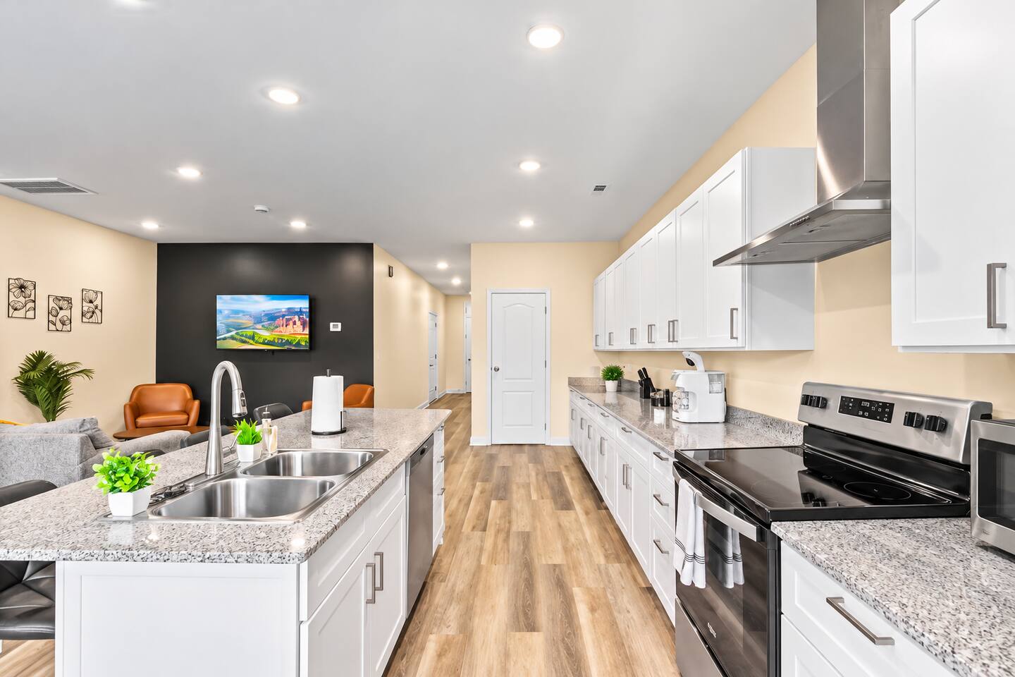 With premium appliances and plenty of counter space, this kitchen is perfect for both cooking and entertaining in your new townhouse.