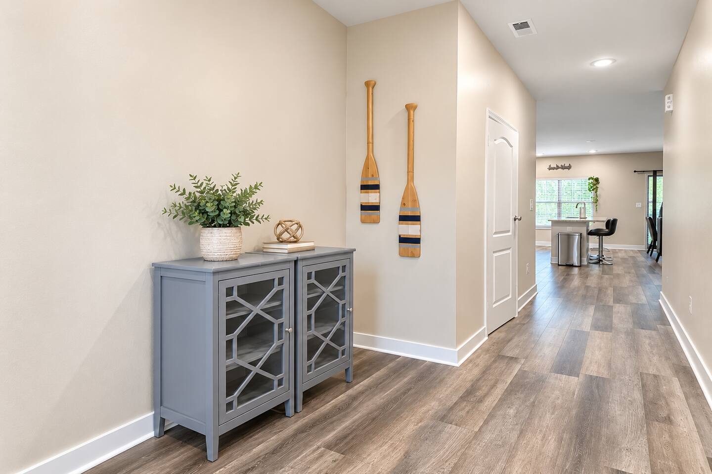 Featuring a sleek design and enhanced security, the front door of this townhouse ensures both style and peace of mind.