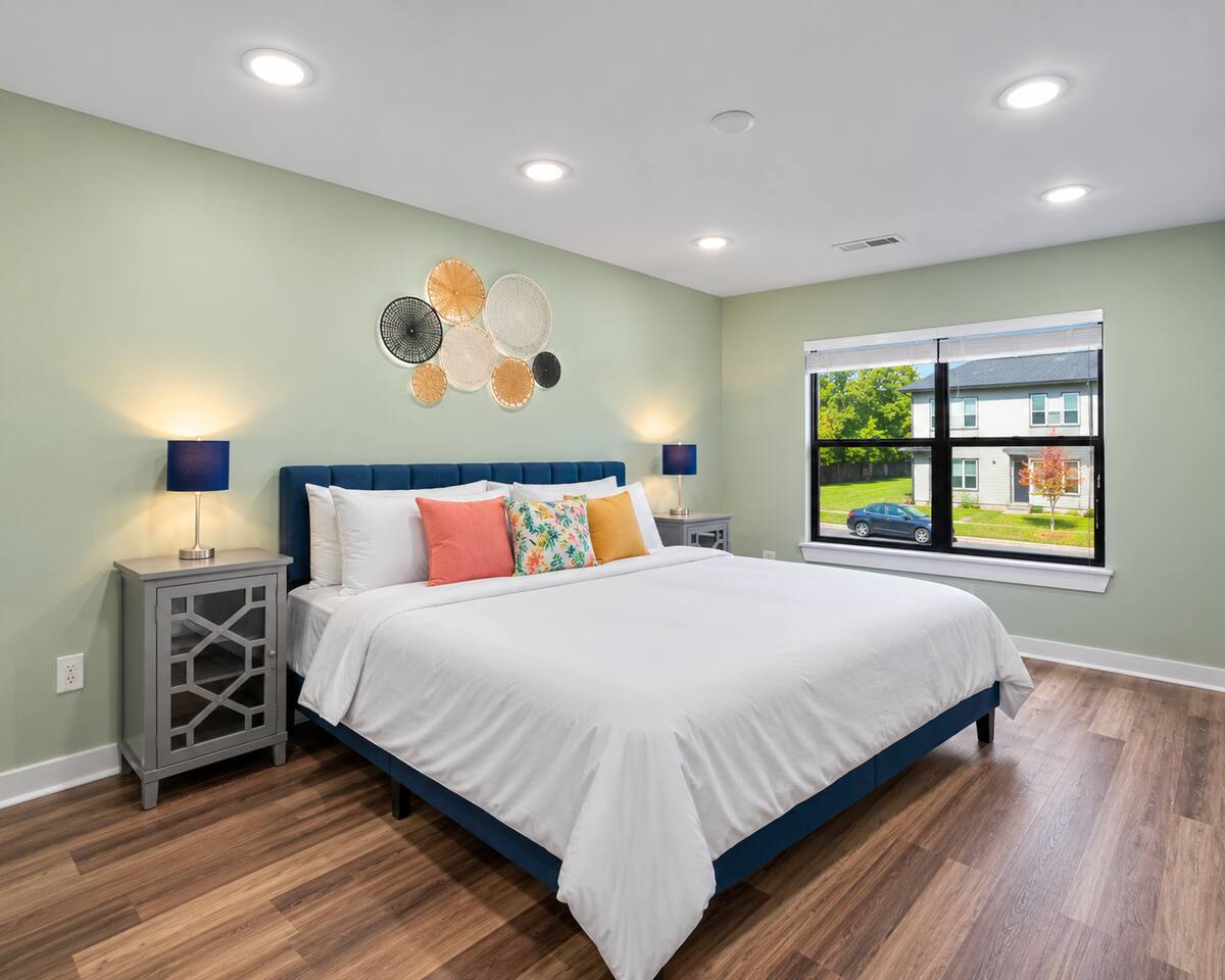 Bright & Airy Master Bedroom – This spacious master bedroom offers plenty of room for all your furniture, with gorgeous natural light streaming through windows.
