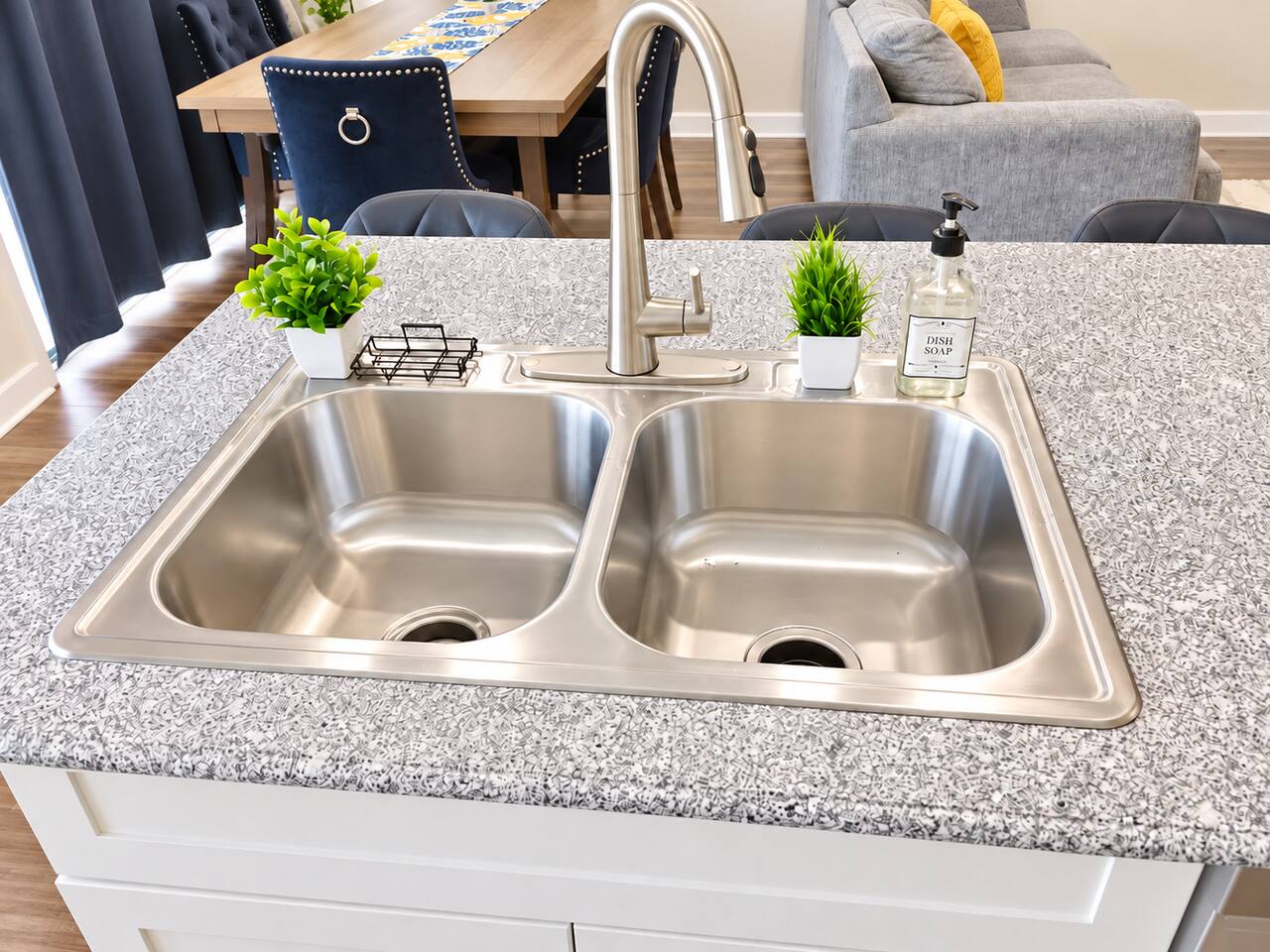 With premium appliances and plenty of counter space, this kitchen is perfect for both cooking and entertaining in your new townhouse.
