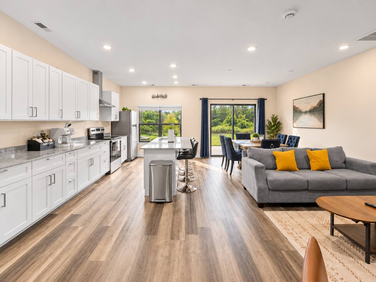 Modern and Inviting Lounge – Featuring an open layout, this lounge area provides a seamless flow for relaxation and social gatherings in your Charlotte townhouse.