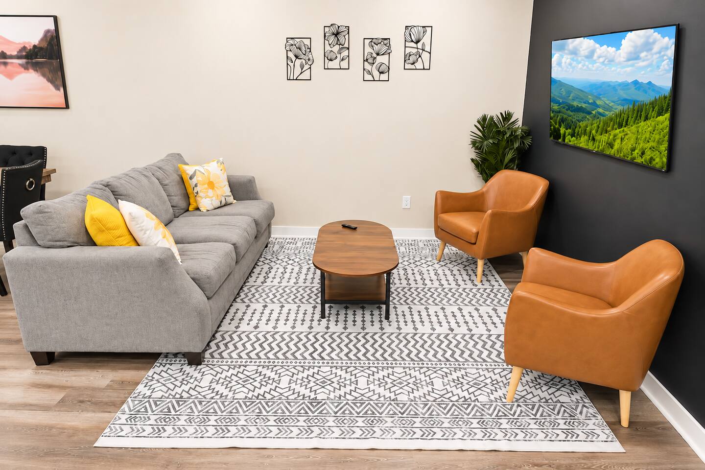 ✨ Kick back and unwind in this bright, comfortable living room featuring cozy seating and a large Smart TV
