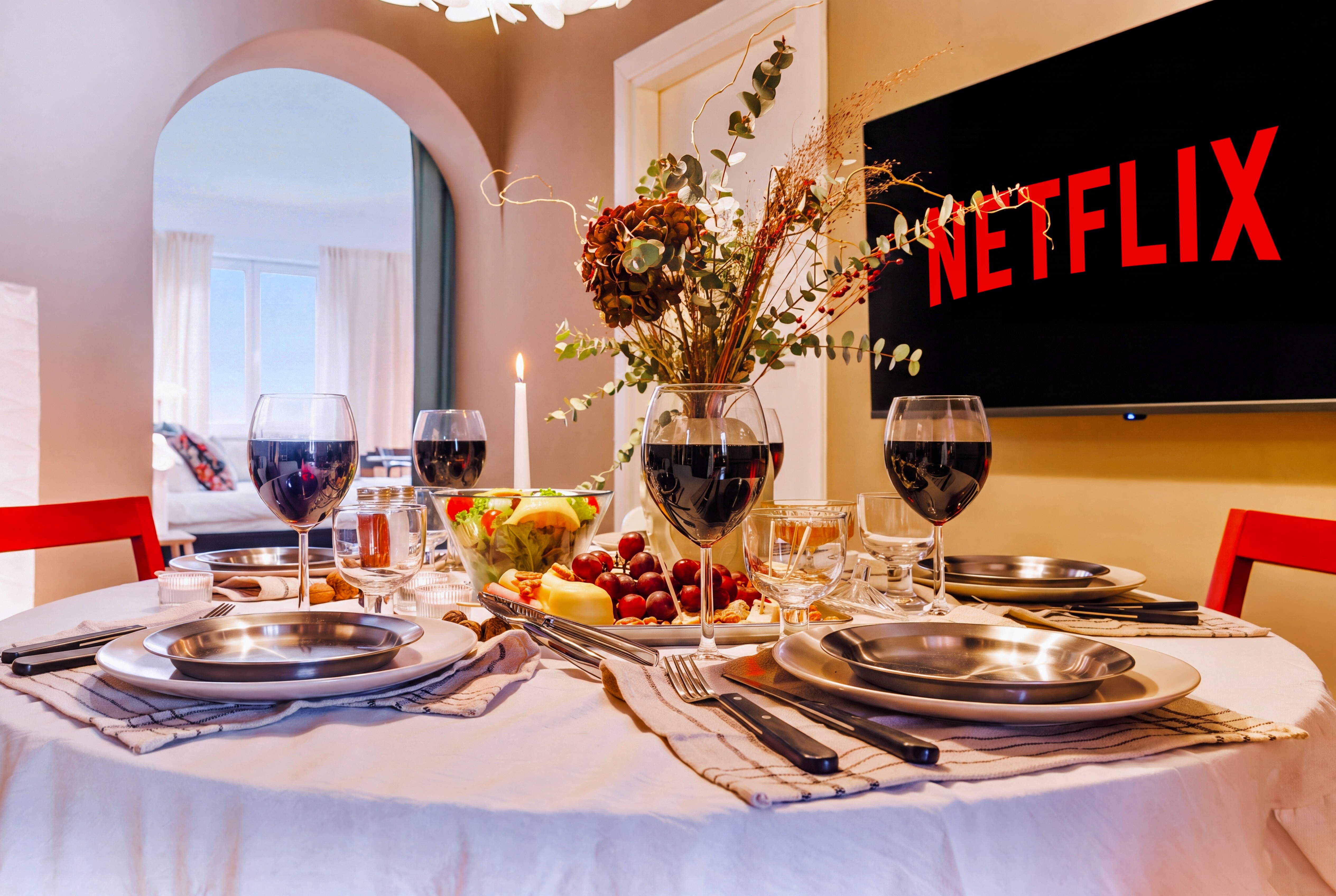 Cozy dinner setup with Netflix, candlelight, and stylish dining decor