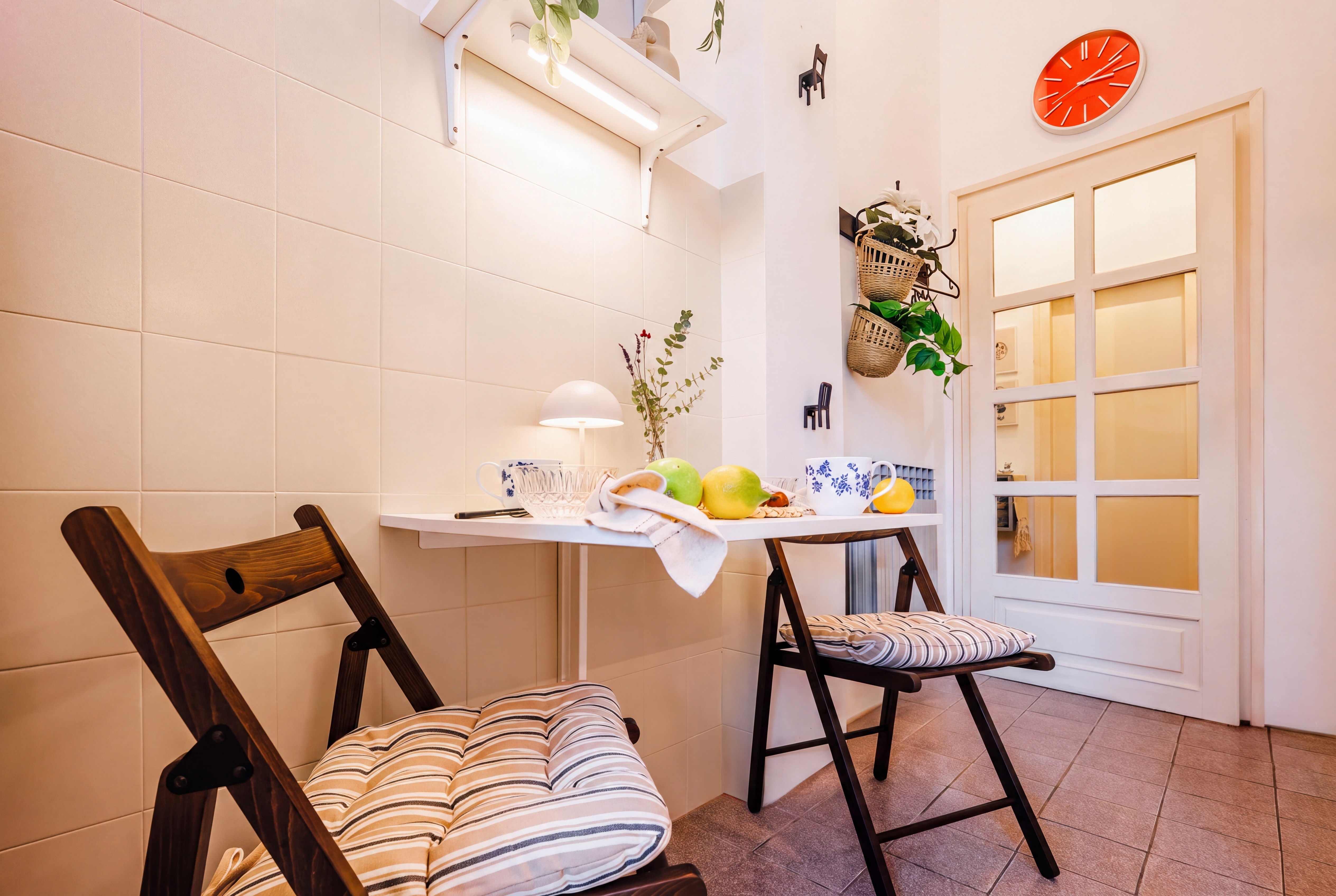 Charming breakfast nook with cozy seating and warm, inviting decor