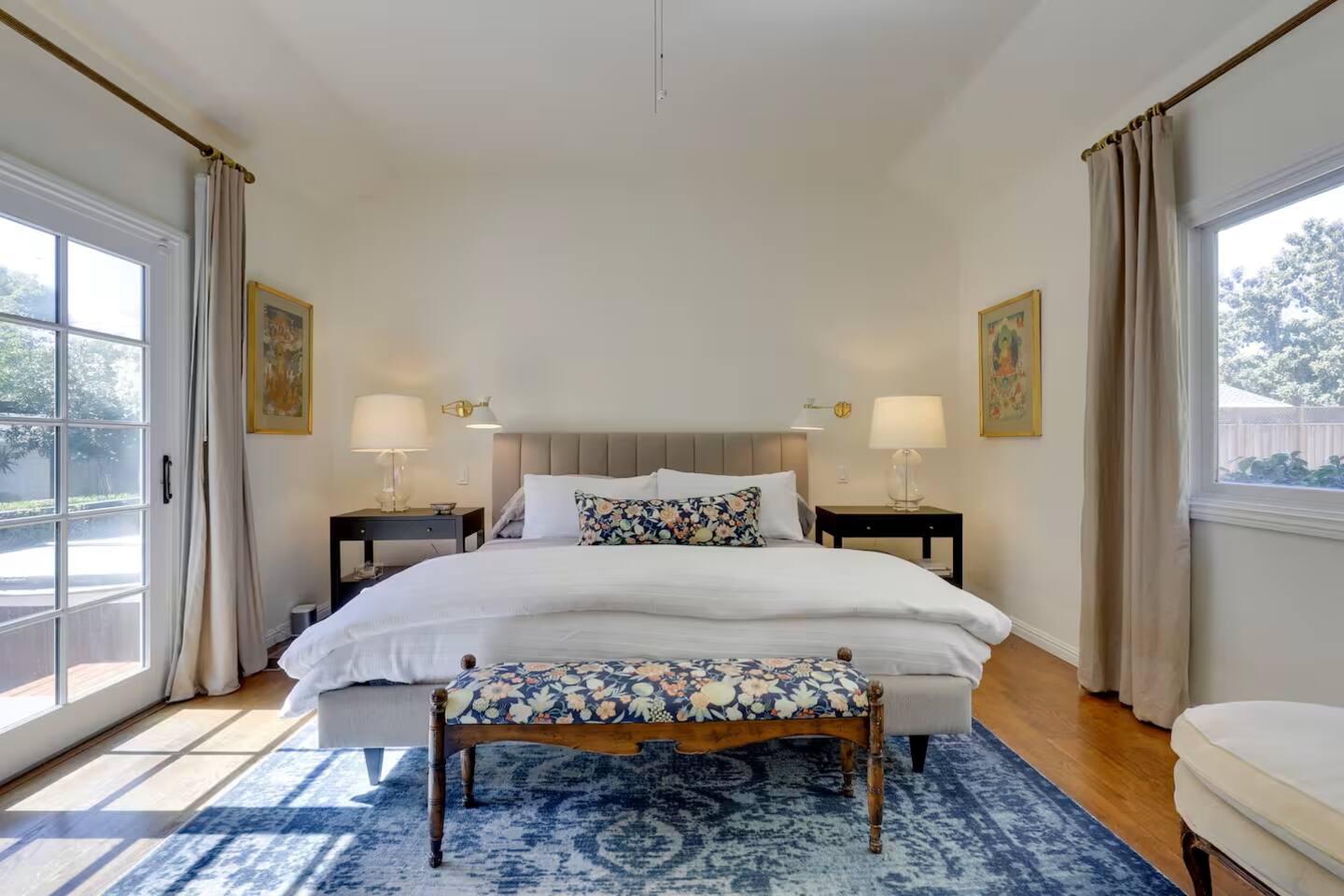 Relax in luxury—the master bedroom features a spacious king bed for a restful night’s sleep.