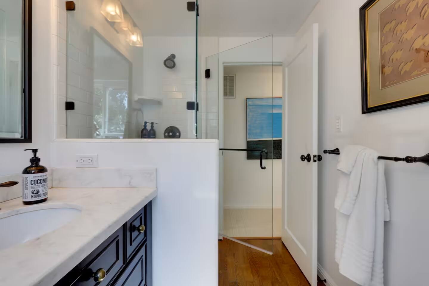 Enjoy the modern comfort of a walk-in shower, perfect for a relaxing start or end to your day.