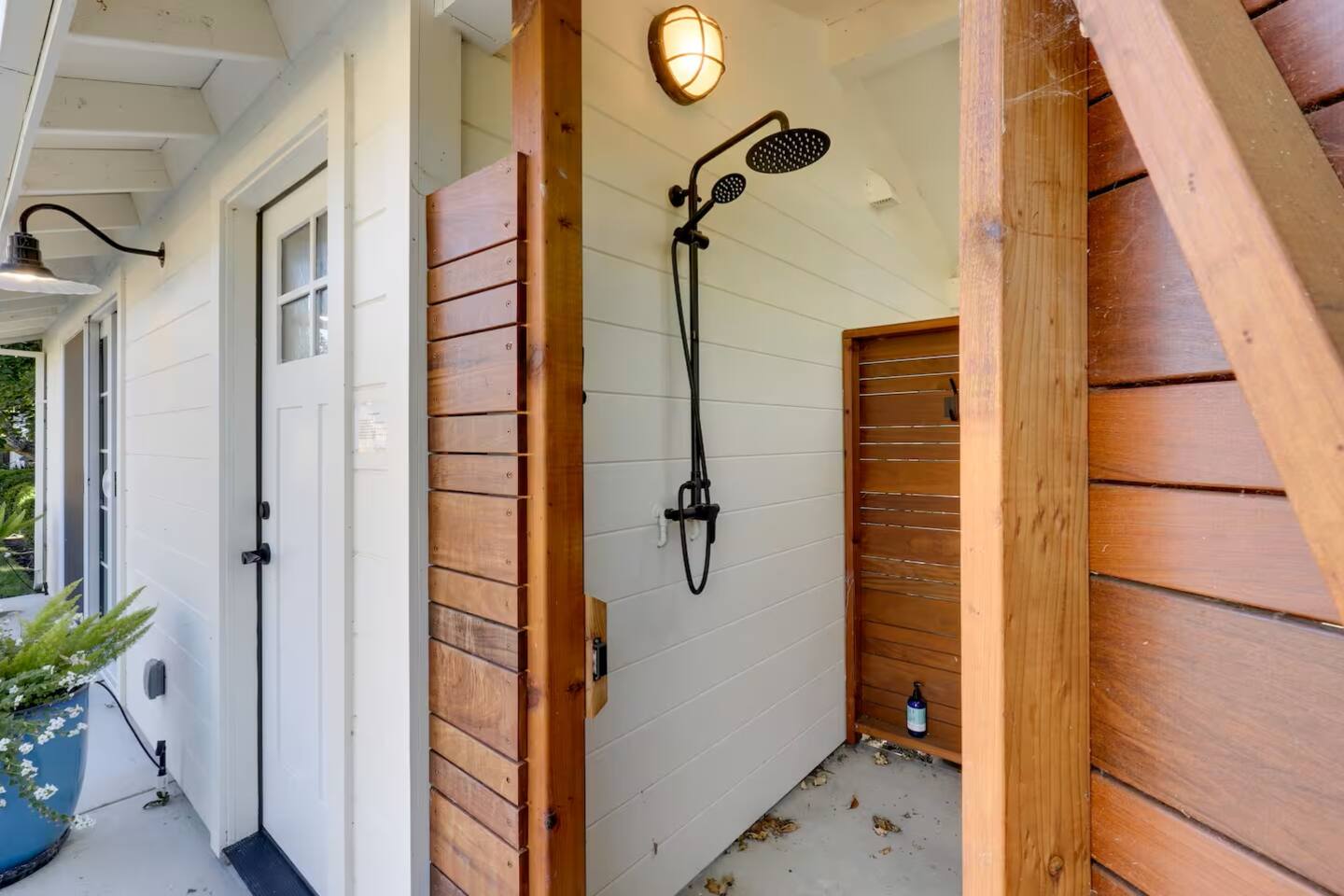 Convenience meets comfort with an outdoor bathroom just steps from the pool house.