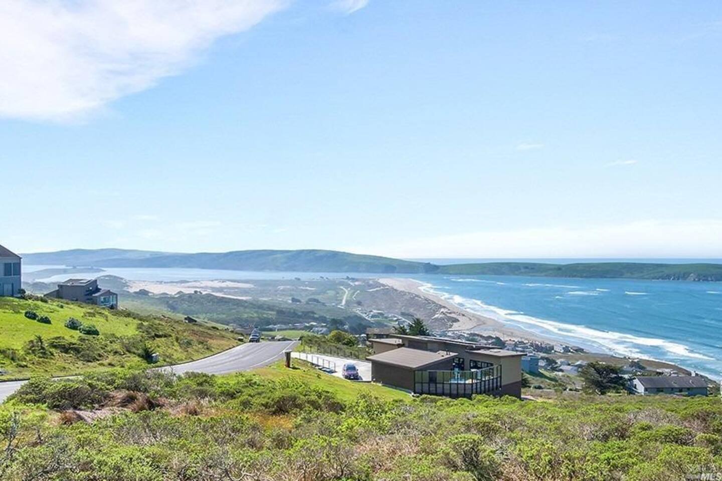 A breathtaking view of the property with its majestic backdrop