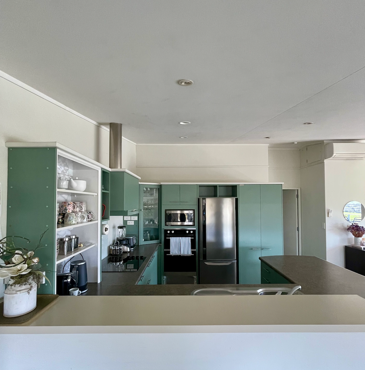 Spacious open-plan kitchen with stylish cabinetry and ample bench space