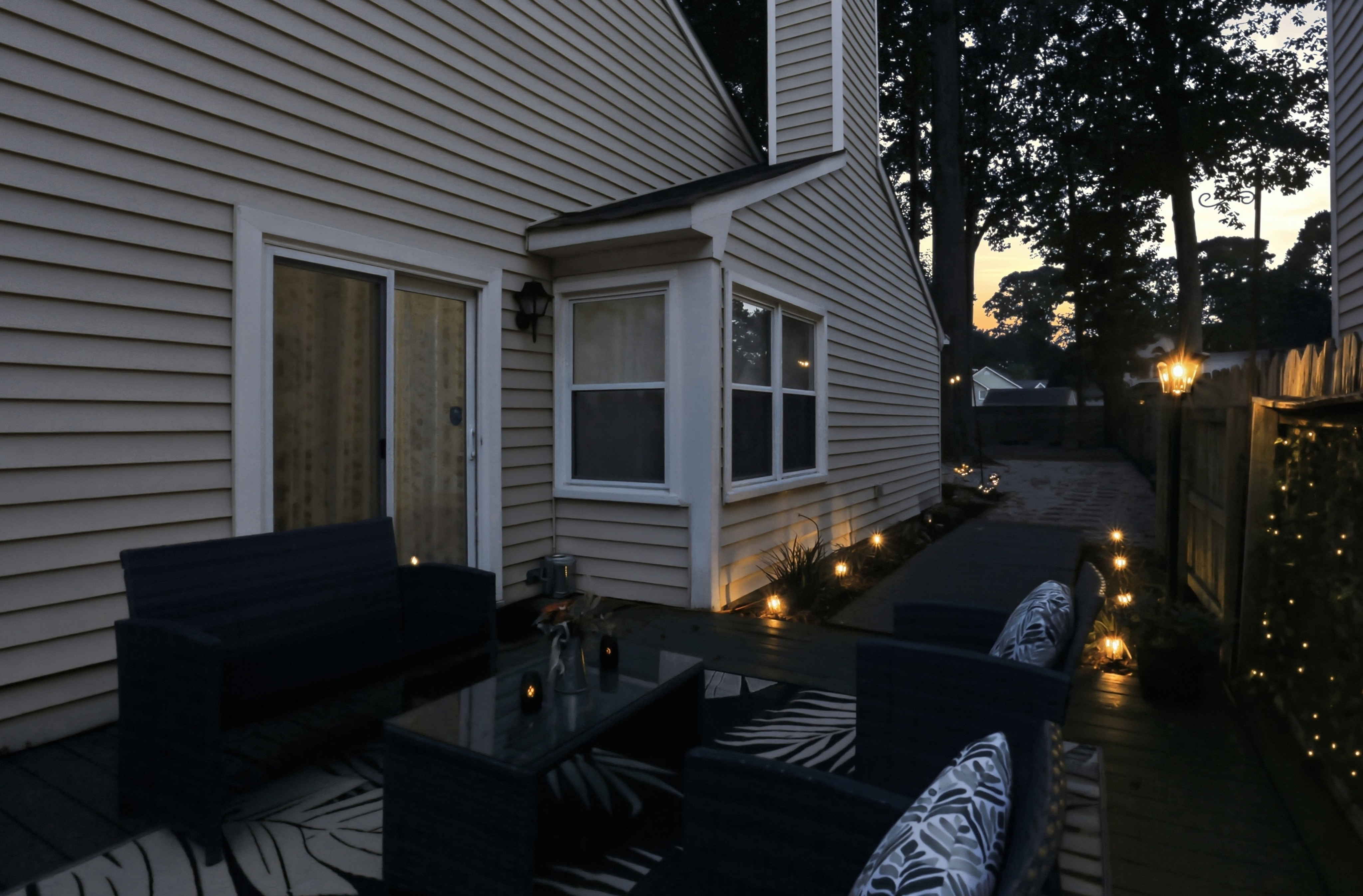 Cozy private patio with ambient lighting for relaxing evenings