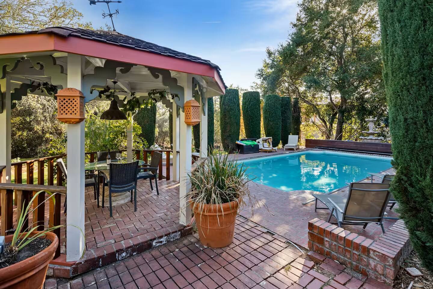 Dine under the gazebo with the sparkling pool by your side.