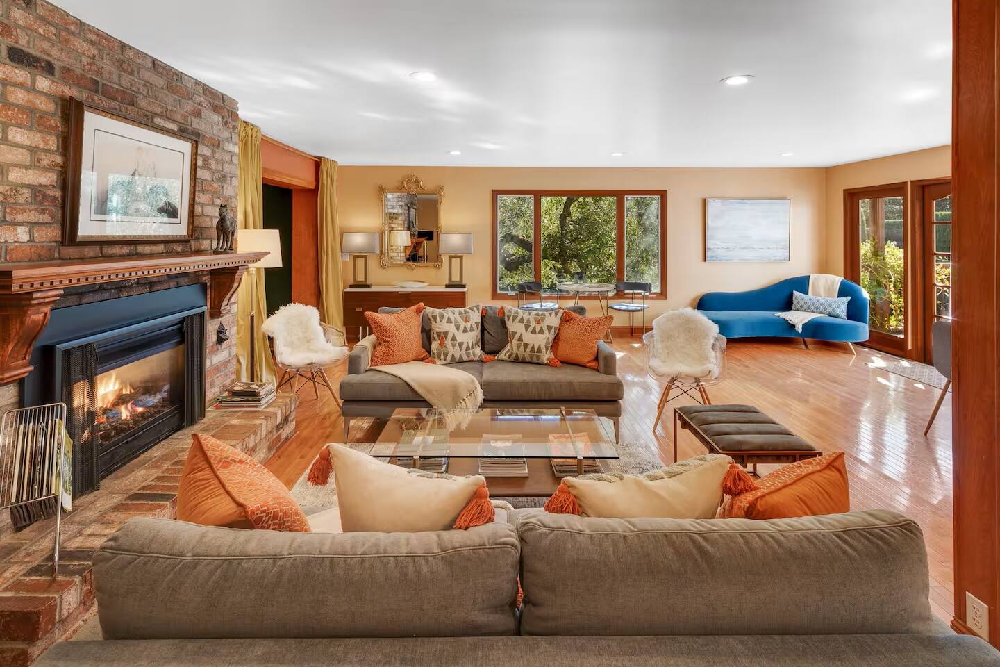 Gather around the cozy fireplace and enjoy heartfelt conversations in this inviting living space.
