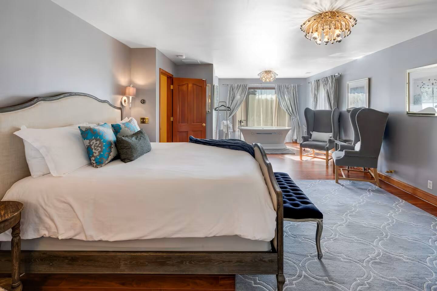 Charming and luxurious, this bedroom blends classic elegance with modern comfort.