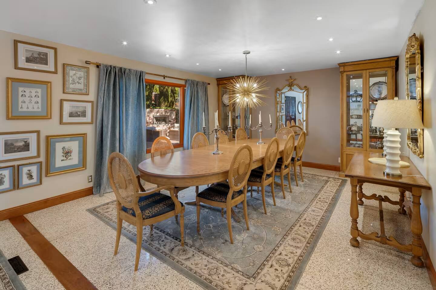 Savor delicious meals and heartfelt conversations at this elegantly set dining table, where every moment feels special.