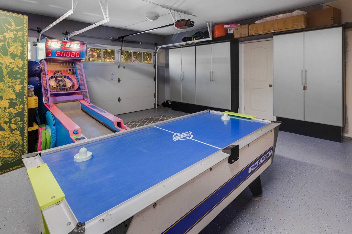 Game on! Enjoy endless fun with air hockey and arcade games in this ultimate game room.
